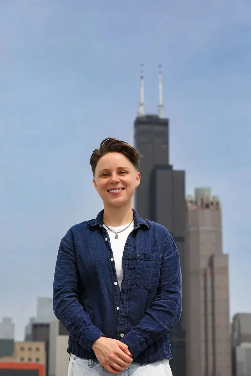 Alexa Cardello, managing partner at Dello Investments, photographed against the Chicago skyline.